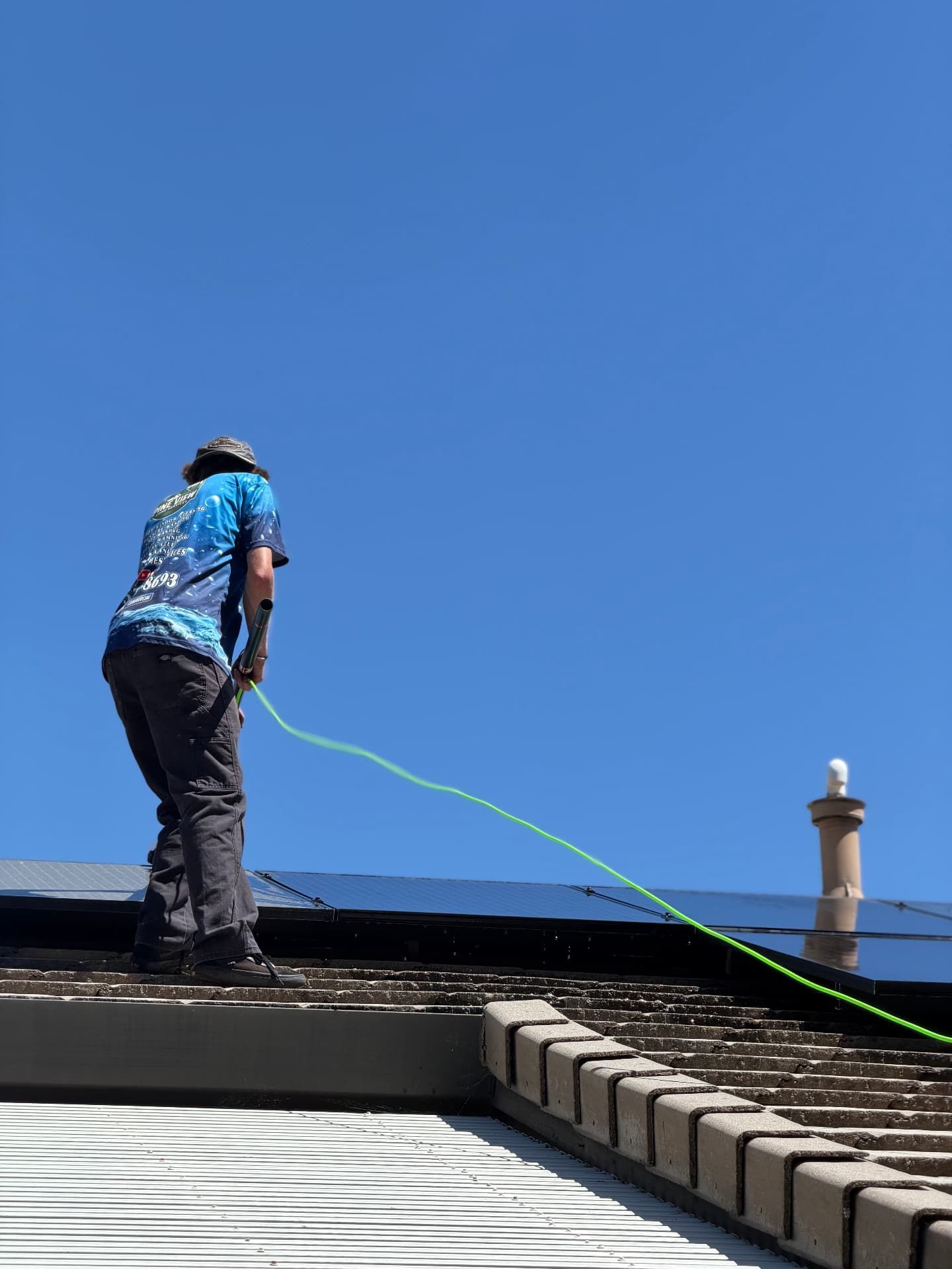 Rinsing solar panels with pure water