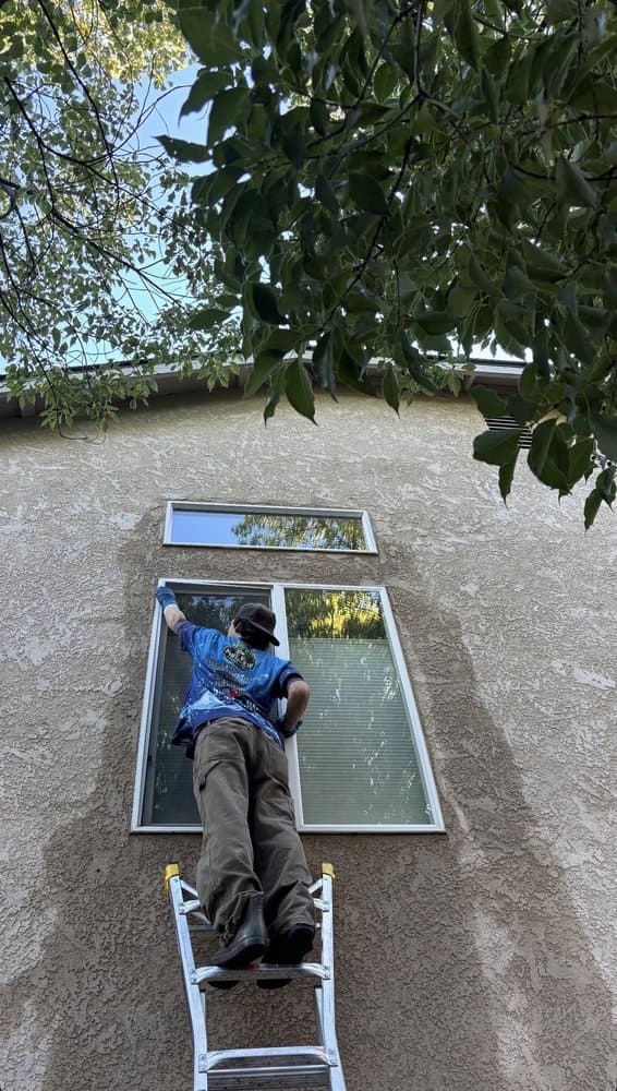 Detail work cleaning a window frame